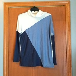 Tunic style turtleneck